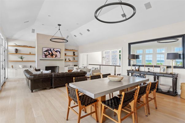 Dining room, Fireplace, Interior, Living room, Pendant Lights, Recessed Lighting, Wood Texture Flooring