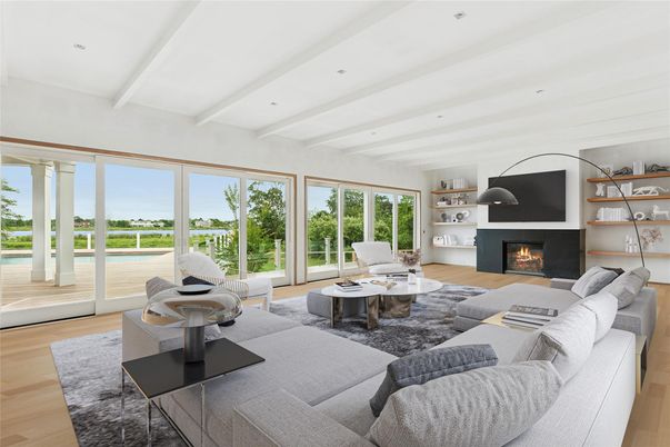 Fireplace, Interior, Living room, Recessed Lighting, Water, Wood Texture Flooring