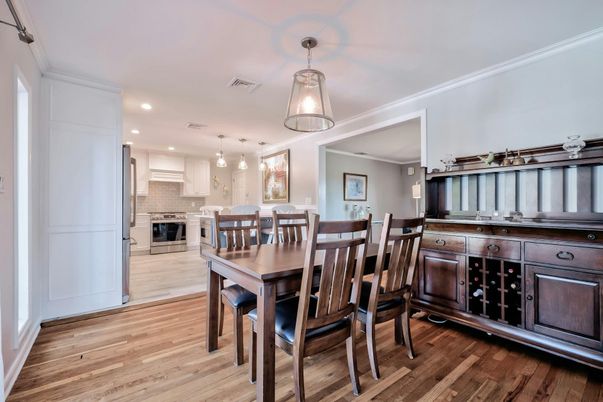 Dining room, Interior, Kitchen, Pendant Lights, Recessed Lighting, Stainless Steel Appliances, Wood Texture Flooring