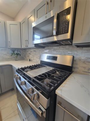 Interior, Kitchen, Marble, Marble Walls, Stainless Steel Appliances