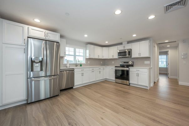 Interior, Kitchen, Recessed Lighting, Stainless Steel Appliances, Wood Texture Flooring