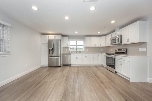 Interior, Kitchen, Recessed Lighting, Stainless Steel Appliances, Wood Texture Flooring