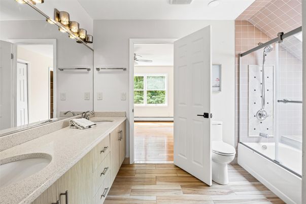 Bathroom, Dual Sink Vanities, Glass Shower, Interior, Wood Texture Flooring