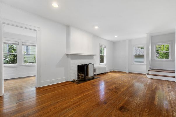 Empty room, Fireplace, Interior, Recessed Lighting, Wood Texture Flooring