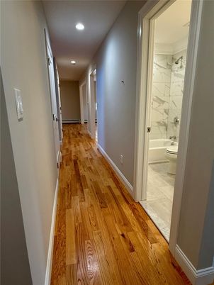 Bathroom, Interior, Marble, Marble Walls, Recessed Lighting, Wood Texture Flooring