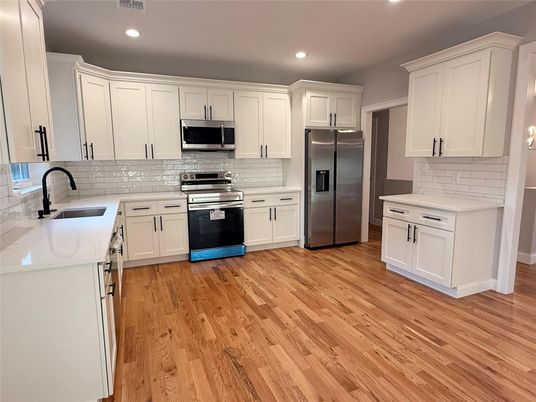 Interior, Kitchen, Recessed Lighting, Stainless Steel Appliances, Wood Texture Flooring