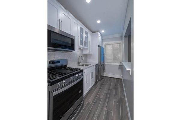 Interior, Kitchen, Recessed Lighting, Stainless Steel Appliances, Wood Texture Flooring