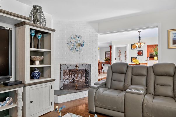 Home Theatre Room, Fireplace, Interior, Pendant Lights, Stone Walls, Wood Texture Flooring