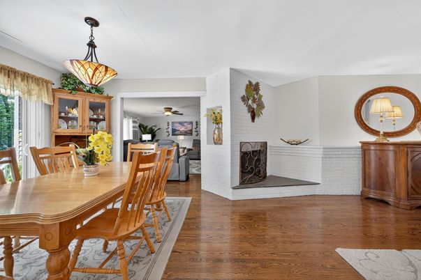 Dining room, Fireplace, Interior, Living room, Pendant Lights, Wood Texture Flooring