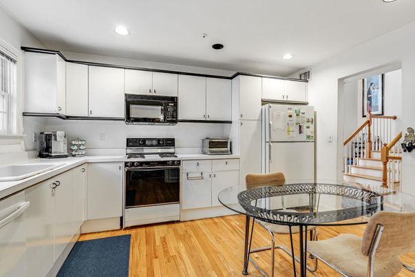 Dining room, Interior, Kitchen, Recessed Lighting, Stainless Steel Appliances, Wood Texture Flooring