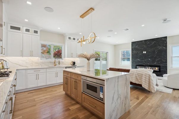 Fireplace, Interior, Kitchen, Living room, Marble Walls, Pendant Lights, Recessed Lighting, Wood Texture Flooring
