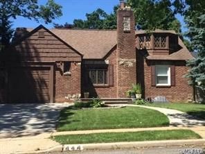 Attached, Backyard, Exterior, Facade, Brick Facade, Tudor Revival