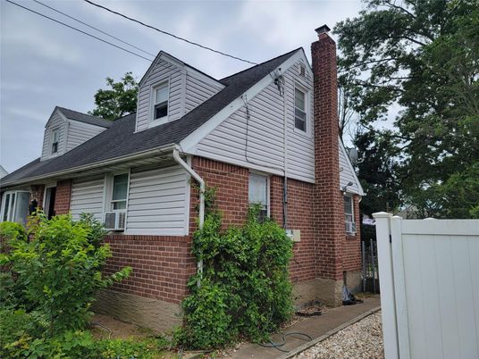 Exterior, Facade, Brick Facade, Cape Cod