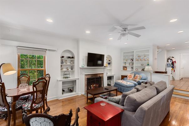 Dining room, Fireplace, Interior, Living room, Recessed Lighting, Wood Texture Flooring