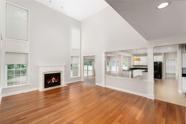 Empty room, Fireplace, Interior, Kitchen, Pendant Lights, Recessed Lighting, Wood Texture Flooring