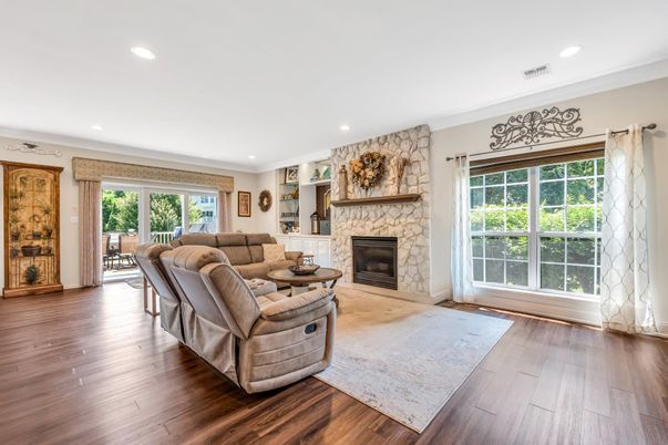 Fireplace, Interior, Living room, Recessed Lighting, Stone Walls, Wood Texture Flooring