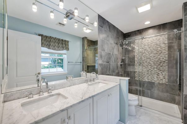 Bathroom, Dual Sink Vanities, Glass Shower, Interior, Marble, Recessed Lighting