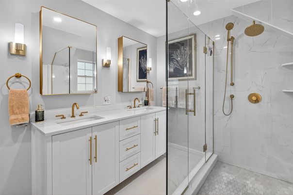 Bathroom, Dual Sink Vanities, Glass Shower, Interior, Marble Walls, Recessed Lighting