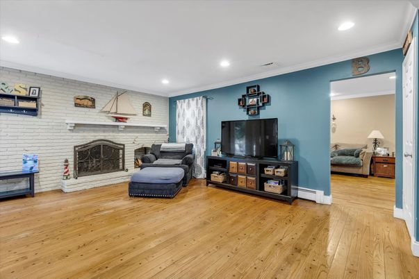 Fireplace, Interior, Recessed Lighting, Stone Walls, Wood Texture Flooring