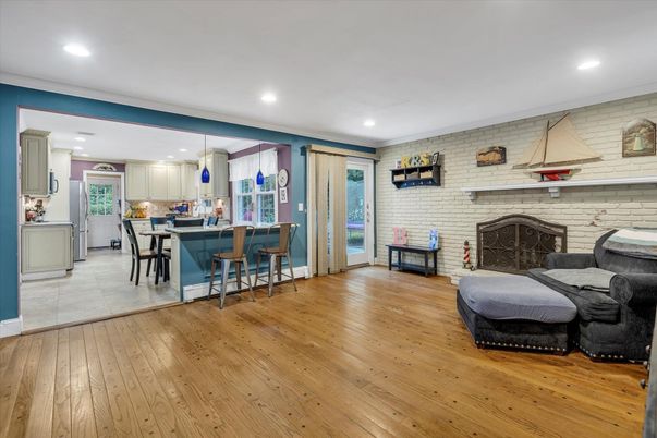 Fireplace, Interior, Kitchen, Recessed Lighting, Stone Walls, Wood Texture Flooring