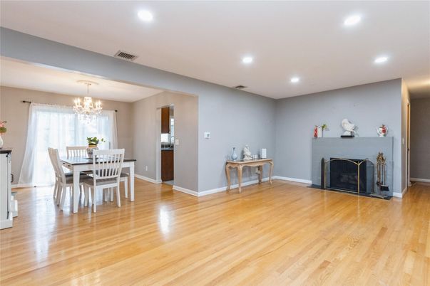 Chandelier, Dining room, Fireplace, Interior, Recessed Lighting, Wood Texture Flooring