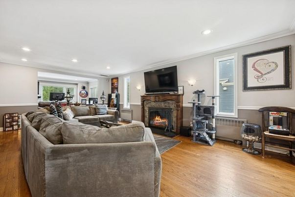 Fireplace, Interior, Living room, Recessed Lighting, Wood Texture Flooring