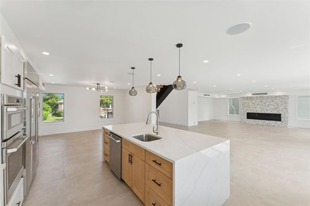 Fireplace, Interior, Kitchen, Pendant Lights, Recessed Lighting, Stainless Steel Appliances