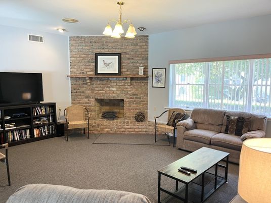 Chandelier, Fireplace, Interior, Living room, Stone Walls