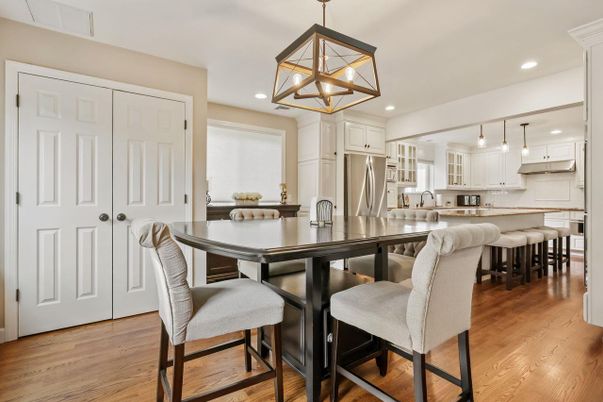 Dining room, Interior, Kitchen, Pendant Lights, Recessed Lighting, Stainless Steel Appliances, Wood Texture Flooring