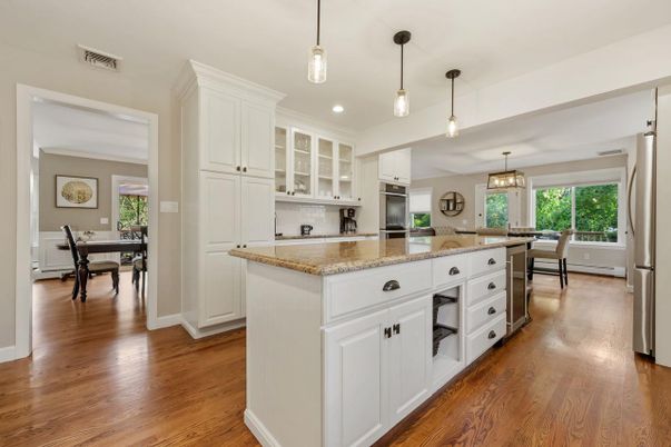 Dining room, Interior, Kitchen, Pendant Lights, Recessed Lighting, Stainless Steel Appliances, Wood Texture Flooring