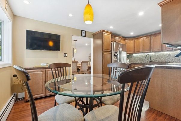 Dining room, Interior, Kitchen, Pendant Lights, Recessed Lighting, Stainless Steel Appliances, Wood Texture Flooring