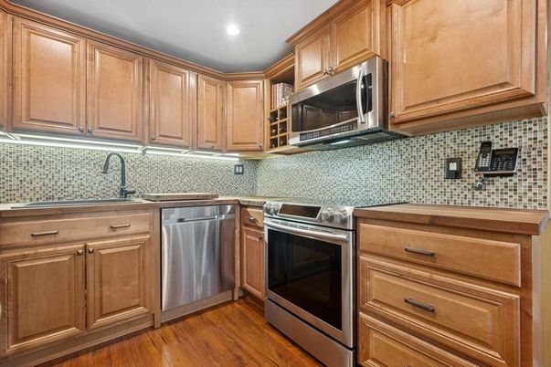 Interior, Kitchen, Recessed Lighting, Stainless Steel Appliances, Wood Texture Flooring