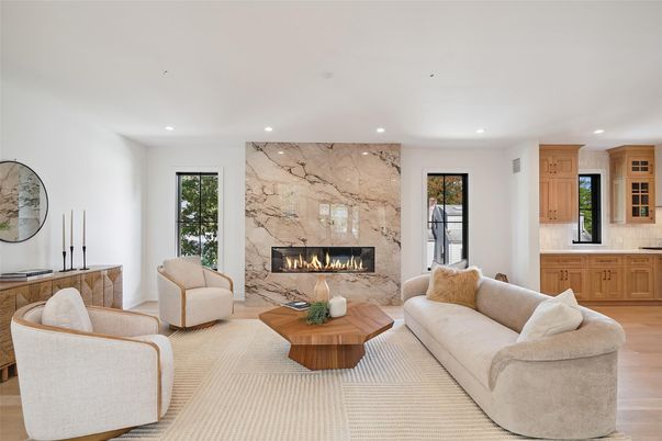Fireplace, Interior, Living room, Marble Walls, Recessed Lighting, Wood Texture Flooring