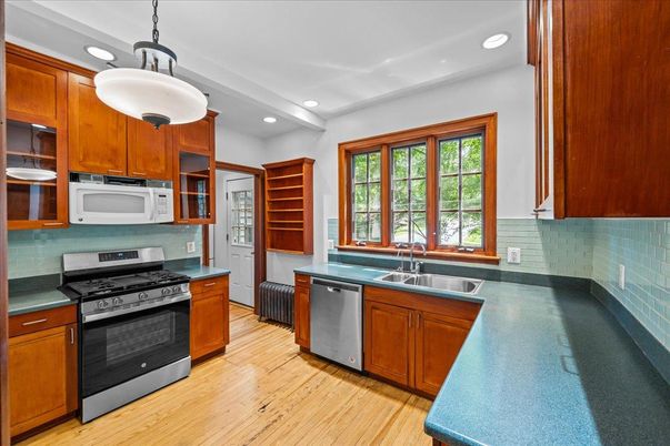 Interior, Kitchen, Pendant Lights, Recessed Lighting, Stainless Steel Appliances, Wood Texture Flooring