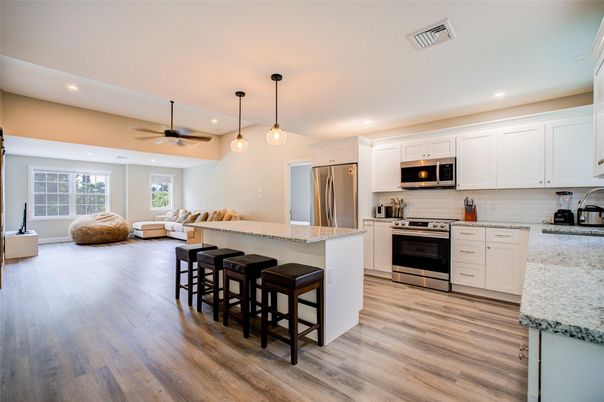 Interior, Kitchen, Living room, Pendant Lights, Recessed Lighting, Stainless Steel Appliances, Wood Texture Flooring