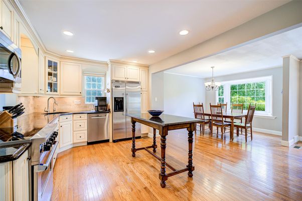 Chandelier, Dining room, Interior, Kitchen, Recessed Lighting, Stainless Steel Appliances, Wood Texture Flooring