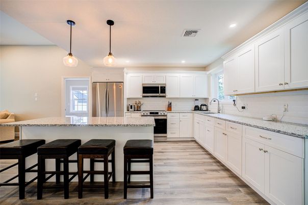 Interior, Kitchen, Pendant Lights, Recessed Lighting, Stainless Steel Appliances, Wood Texture Flooring