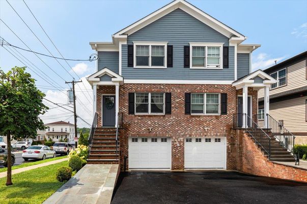 Attached, Exterior, Facade, Brick Facade, American Craftsman