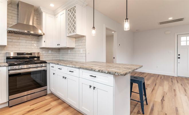 Interior, Kitchen, Pendant Lights, Recessed Lighting, Stainless Steel Appliances, Wood Texture Flooring