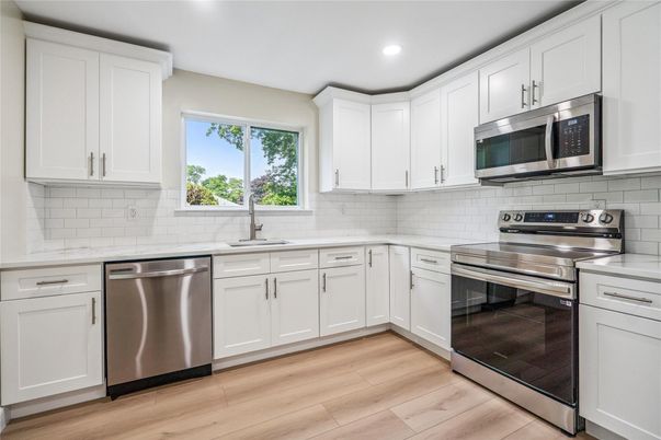 Interior, Kitchen, Recessed Lighting, Stainless Steel Appliances, Wood Texture Flooring