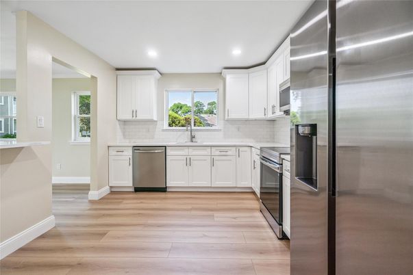 Interior, Kitchen, Recessed Lighting, Stainless Steel Appliances, Wood Texture Flooring