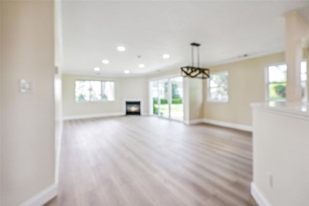 Empty room, Fireplace, Interior, Pendant Lights, Recessed Lighting, Wood Texture Flooring