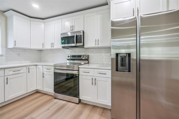 Interior, Kitchen, Recessed Lighting, Stainless Steel Appliances, Wood Texture Flooring