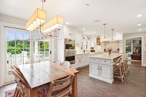 Chandelier, Dining room, Interior, Kitchen, Pendant Lights, Recessed Lighting, Stainless Steel Appliances, Wood Texture Flooring