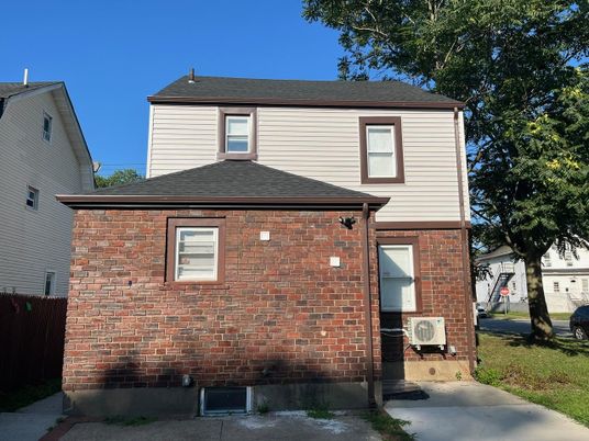 Exterior, Facade, Brick Facade, Raised Ranch