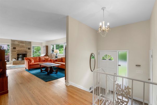 Chandelier, Fireplace, Interior, Living room, Stone Walls, Wood Texture Flooring
