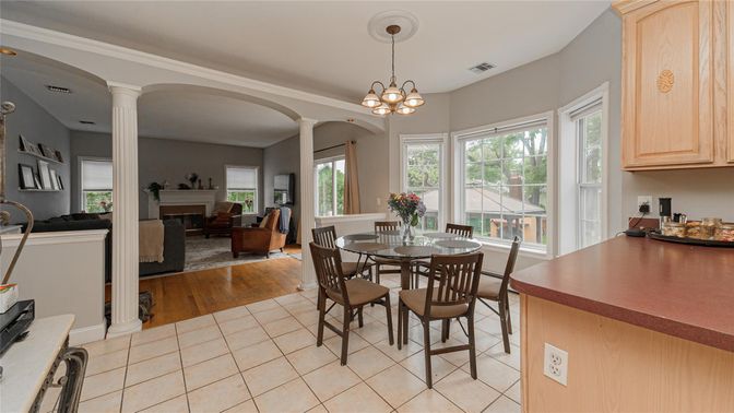 Chandelier, Dining room, Fireplace, Interior, Living room, Pendant Lights, Wood Texture Flooring