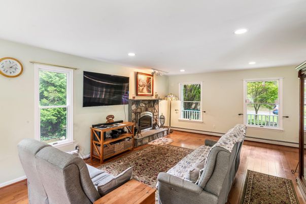 Fireplace, Interior, Living room, Recessed Lighting, Wood Texture Flooring
