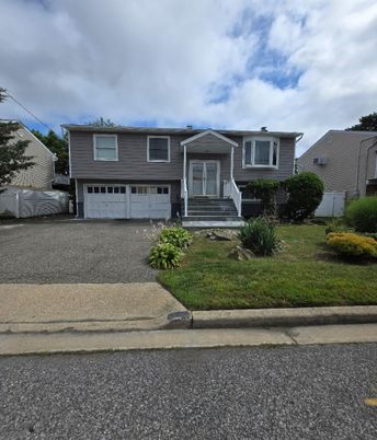 Attached, Exterior, Facade, Raised Ranch