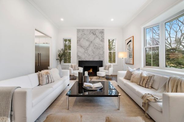 Fireplace, Interior, Living room, Marble Walls, Recessed Lighting, Wood Texture Flooring